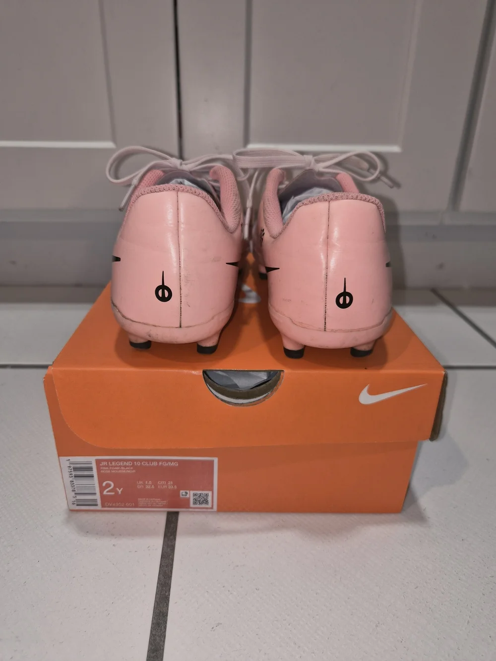 Nike Pink Soccer Cleats with Black Swoosh